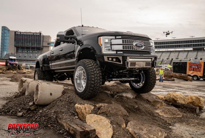 BDS Suspensions 8" long arm coil over lift with recoil traction bars, Bodyguard A2l front and A2 rear Bumpers, with Heise LED lighting everywhere, American Force 24" Contra super single dually wheels with Fury Off Road MT's, Mojave Diablo front and rear shackles with Infinite Rule Lock pins keeping them safe. 