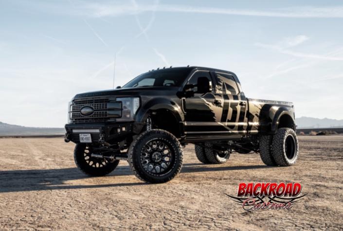 Bodyguard Bumpers A2l front and A2 rear bumpers, BDS Suspensions 8" long arm coilover lift kit, American Force Wheels 24x14 super dually concave wheels, Nitto 38x13.50r24 ridge grappler tires, Heise LED lighting everywhere. build by Backroad Customs & Wade's Window Tint.